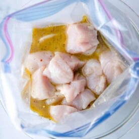 chicken in baggie of marinade