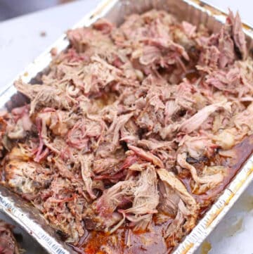 pulled pork butt in a foil pan