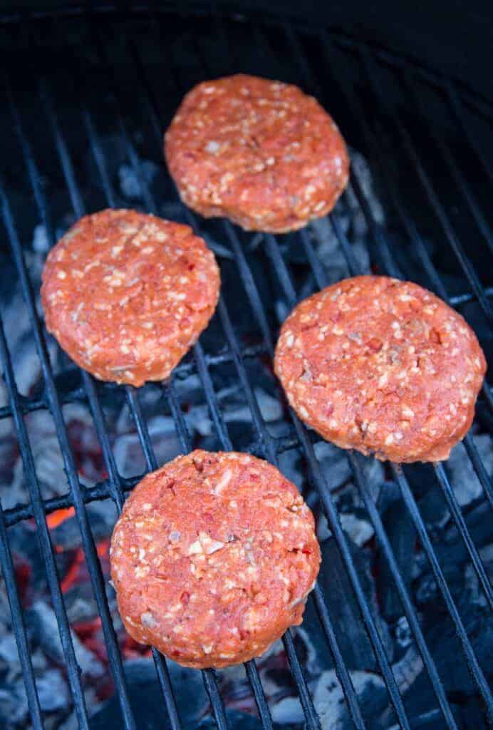 Cooking salmon burgers on the grill