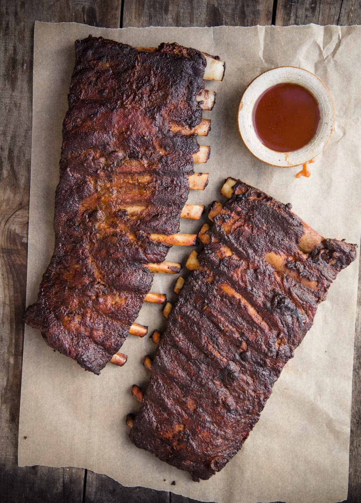 Two racks of smoked spare ribs ready to serve