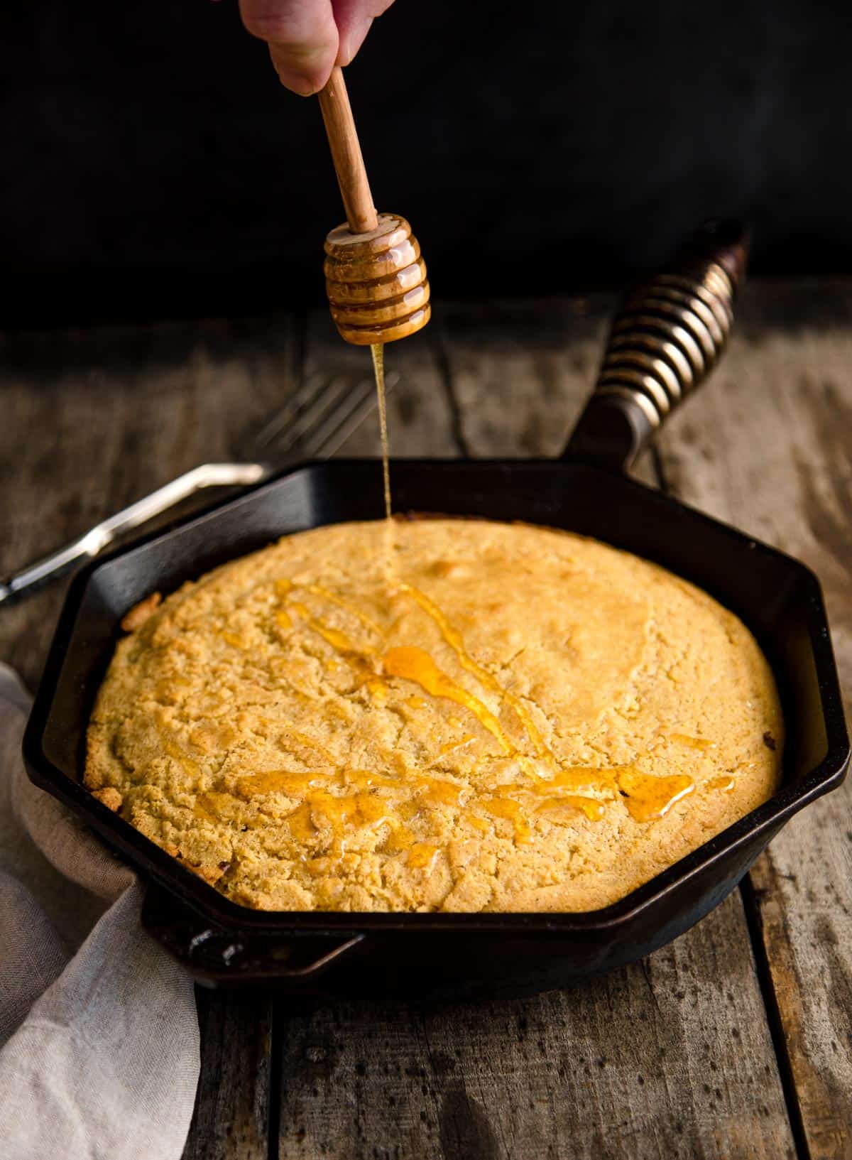 A drizzle of smoked honey over the cornbread.