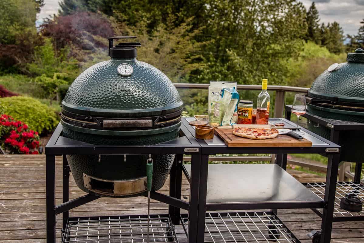 A Big Green Egg Grill set up and ready to grill pizza