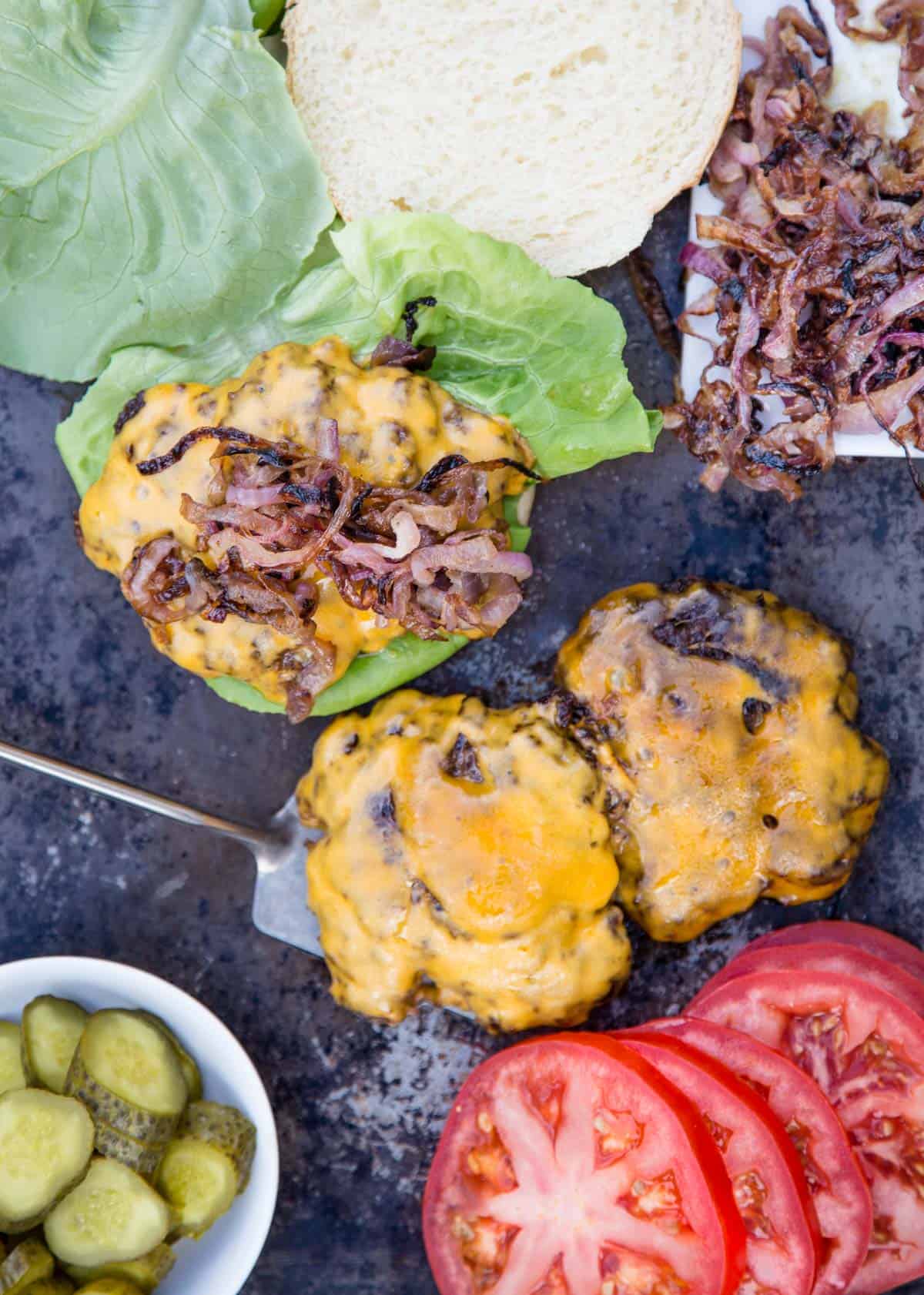 Ingredients for smash burgers on a sheet pan 