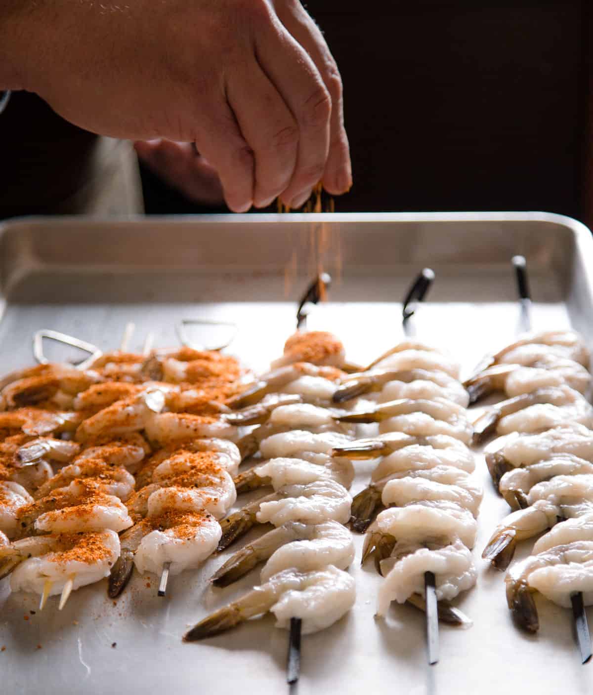 Seasoning shrimp with seafood seasoning