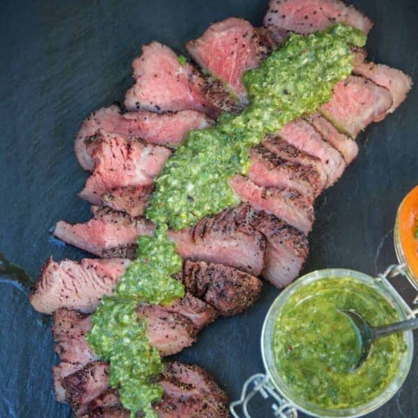 Tri Tip sliced with a chimichurri sauce poured over top