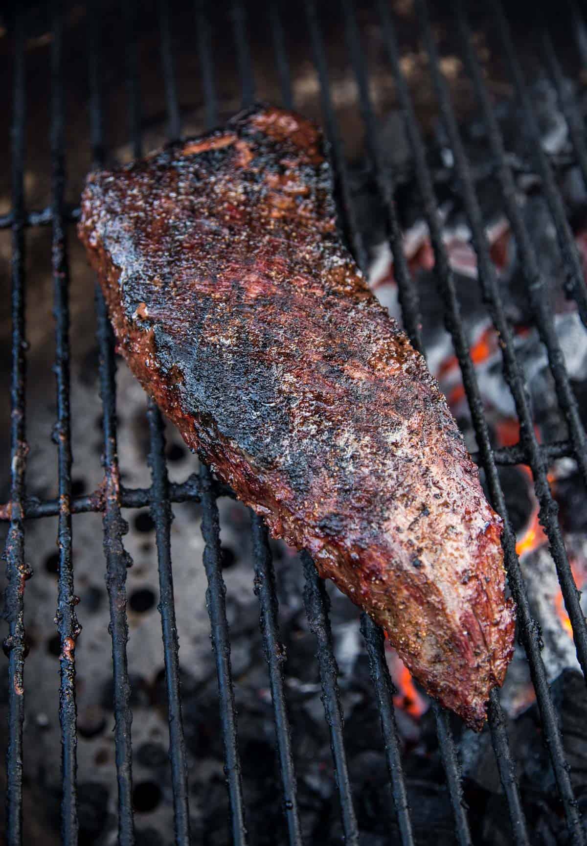 Grilling a beef roast on the grill using two zone cooking