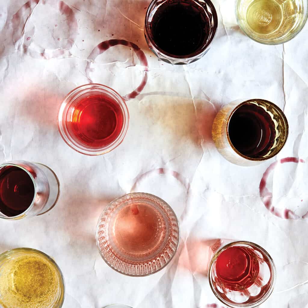 Variations of wine on a table from rose to red.