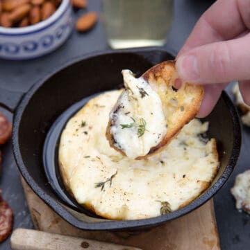 Baked Brie dip with crostini.