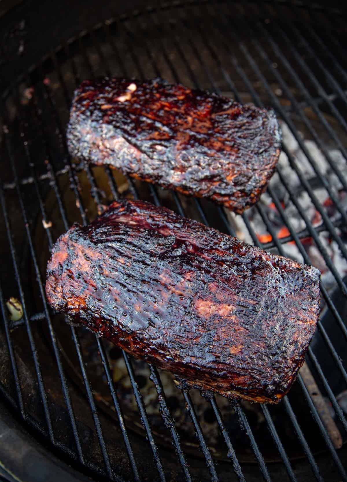 Pork Loin on grill with wine glaze. 