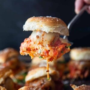 Grilled meatball slider on a spatula.