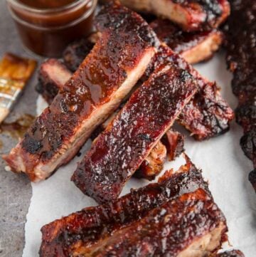 Pellet Grill Ribs smoked and sliced on a plate.