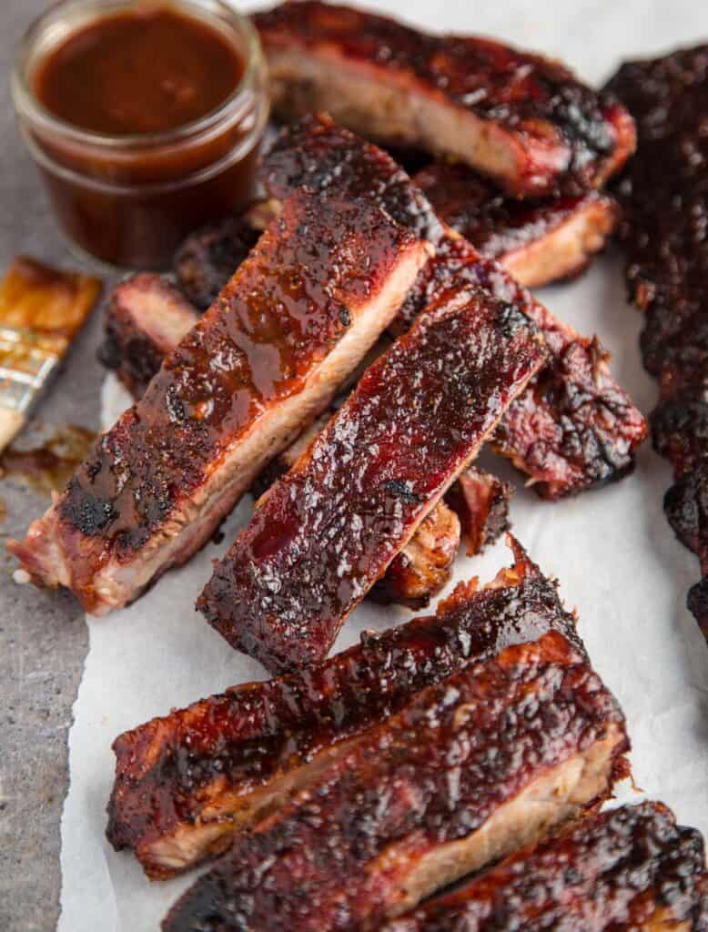 Pellet Grill Ribs smoked and sliced on a plate.