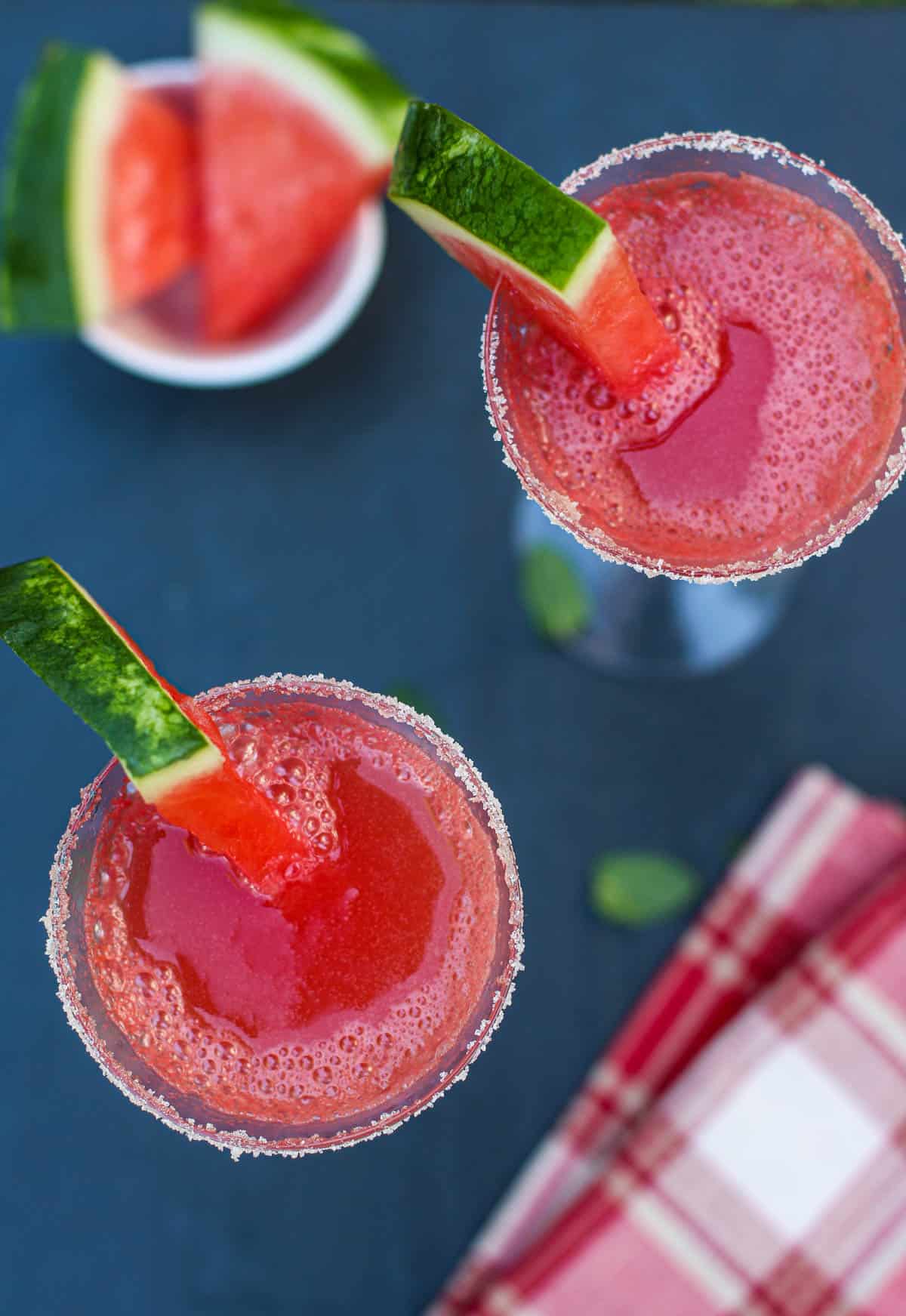A top down image of two watermelon cocktails 