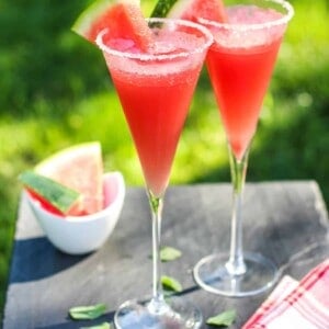 A watermelon cocktail on a table outside
