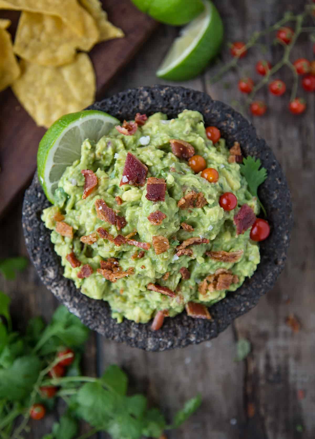 Smoked Bacon Tomatillo Guacamole in a Molcajete