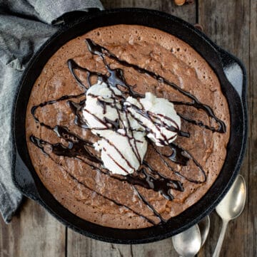 Brownies in a Cast Iron Skillet topped with ice cream