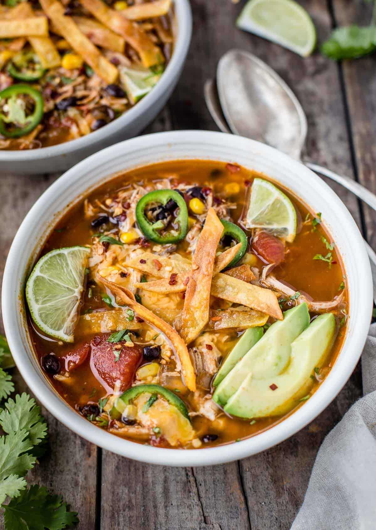 A bowl of chicken tortilla soup made with smoked chicken
