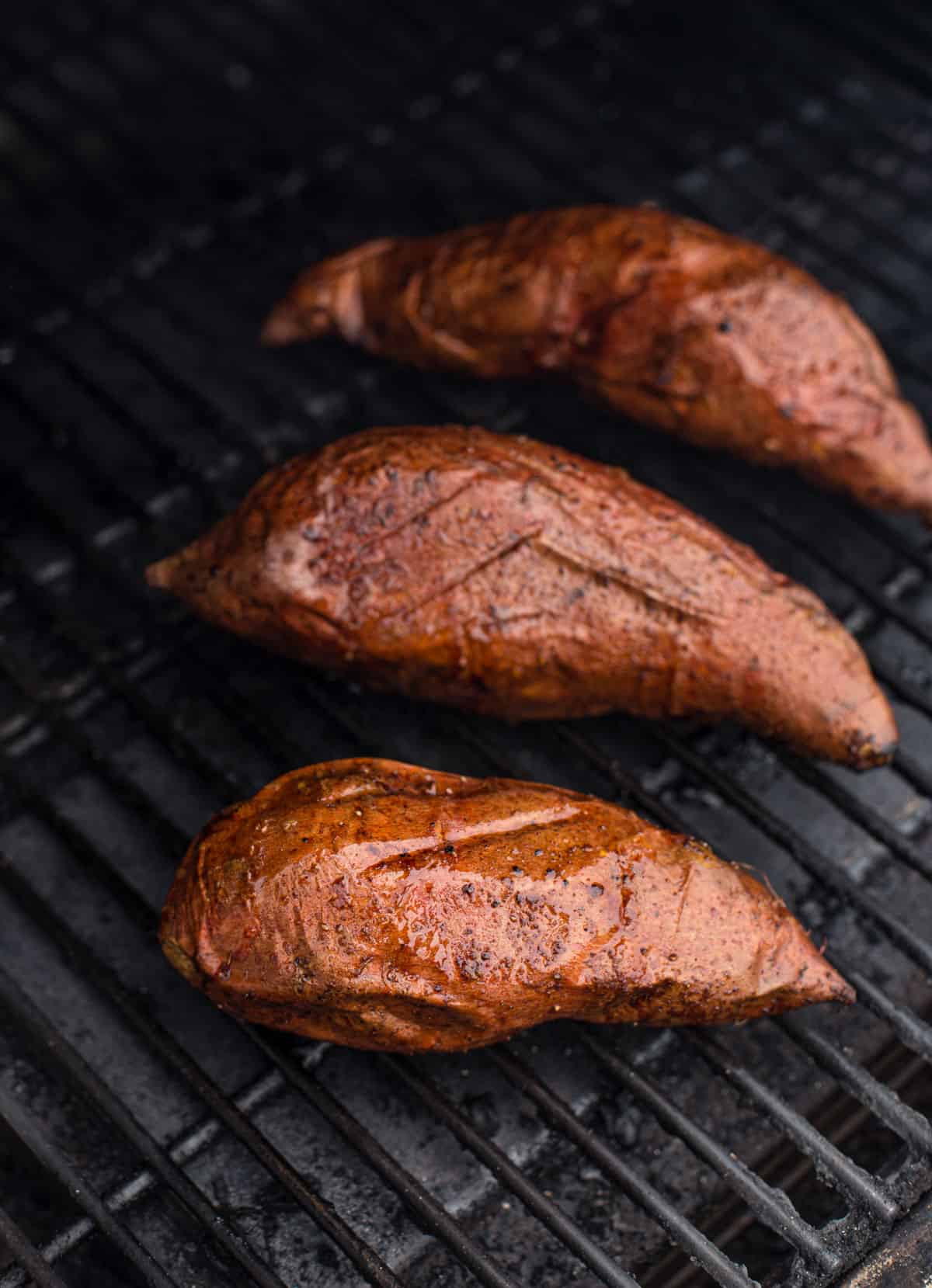 Sweet potatoes baking on the grill