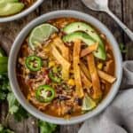 smoked chicken tortilla soup in a bowl.