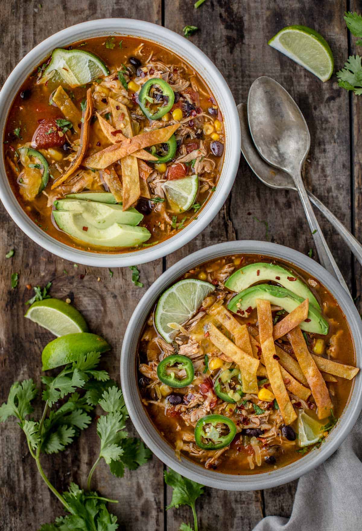 Two bowls of smoked chicken tortilla soup