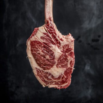 A raw snake river farms wagyu tomahawk steak
