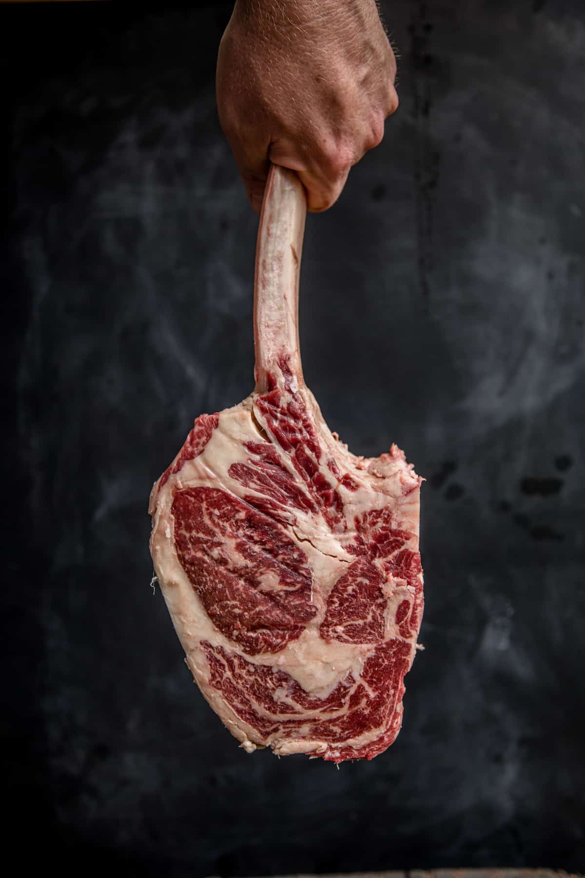 a raw snake river farms American wagyu tomahawk steak