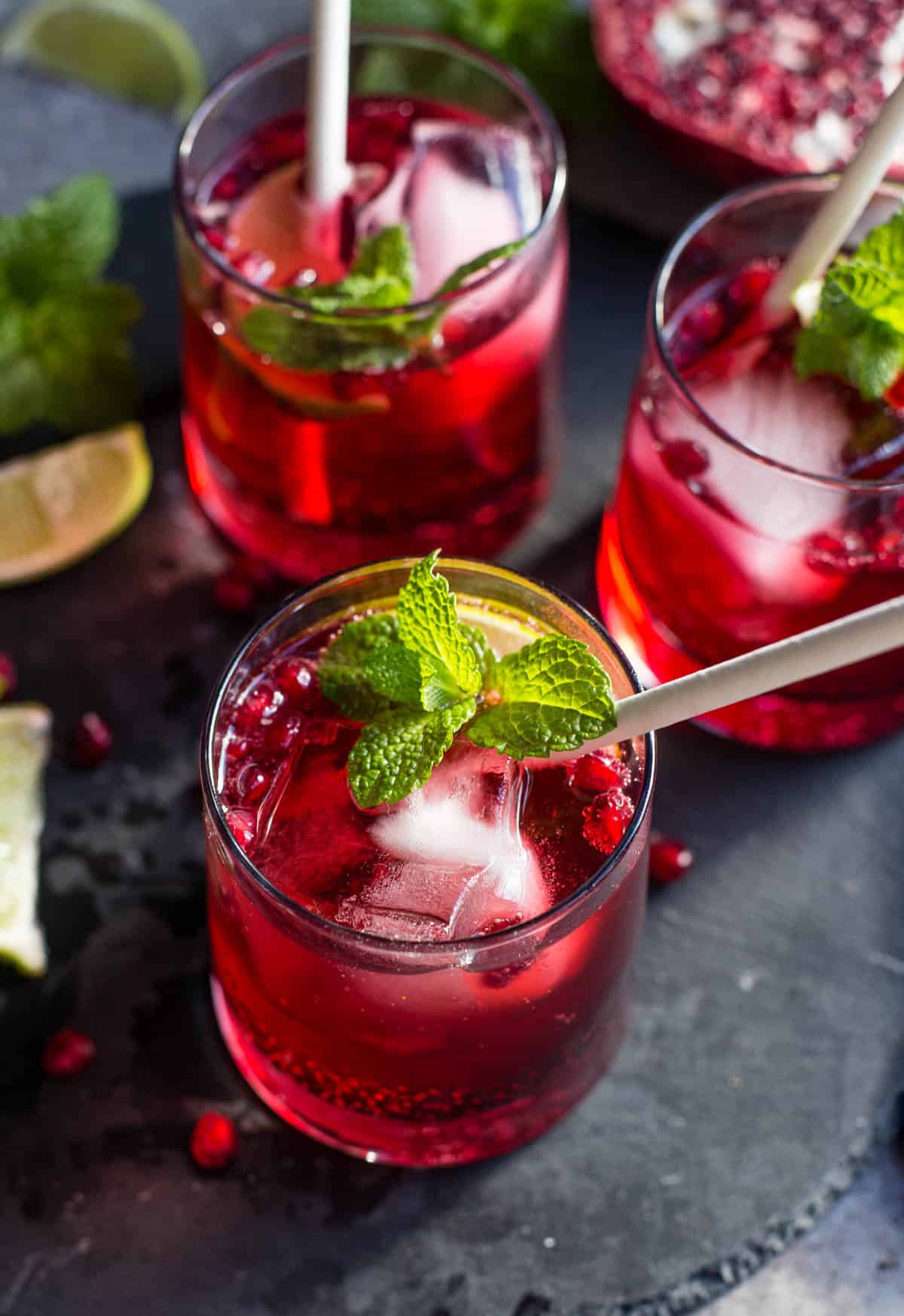 Three Ginger Beer cocktails made with pomegranate juice