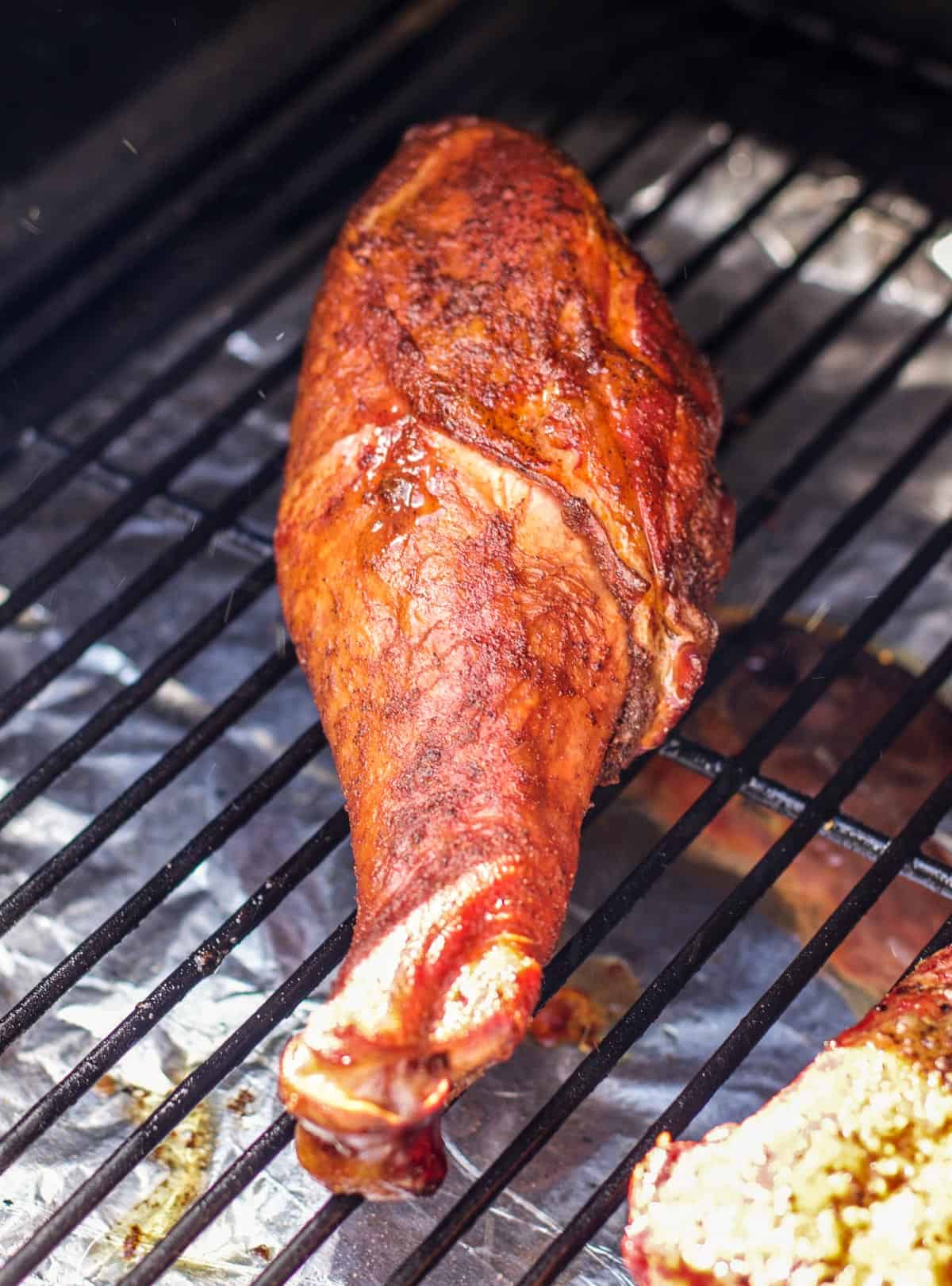 Smoked turkey leg on the smoker.