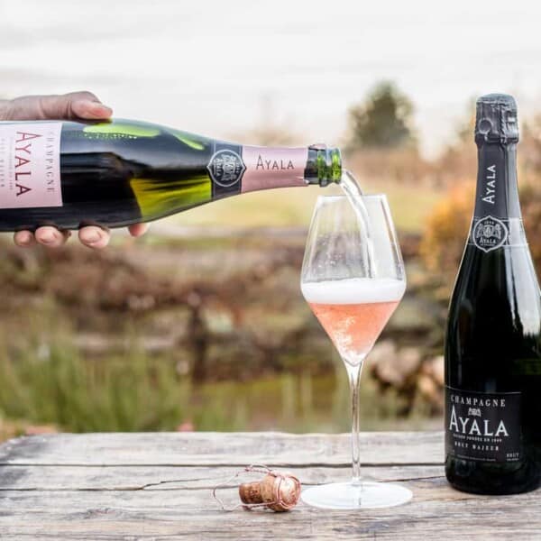 pouring rose sparkling wine