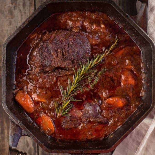 Smoked Chuck Roast in a cast iron dutch oven.