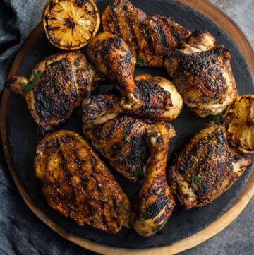 Jerk Grilled Chicken with dry rub on a plate.