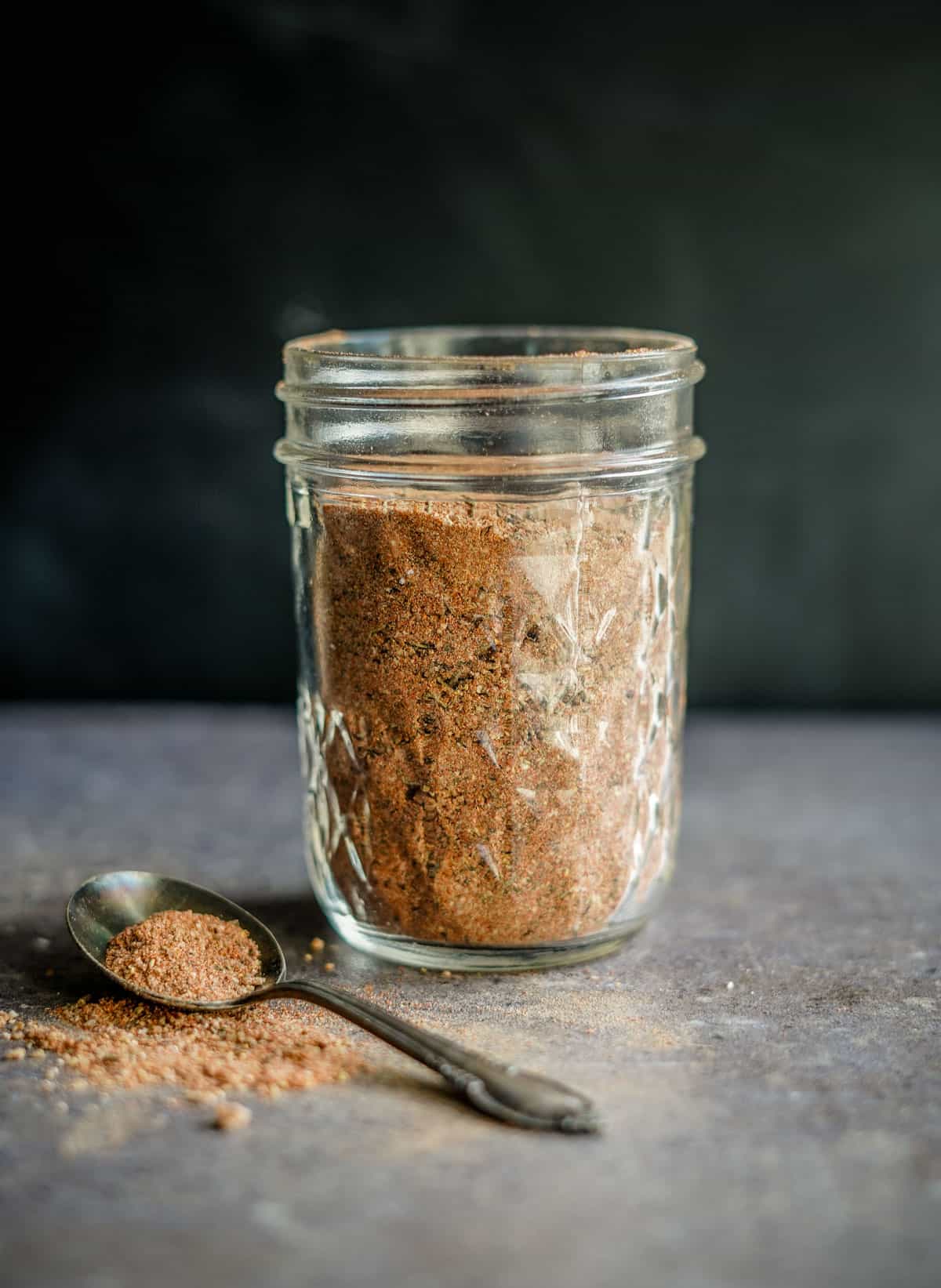 A mason jar full of Jerk Seasoning