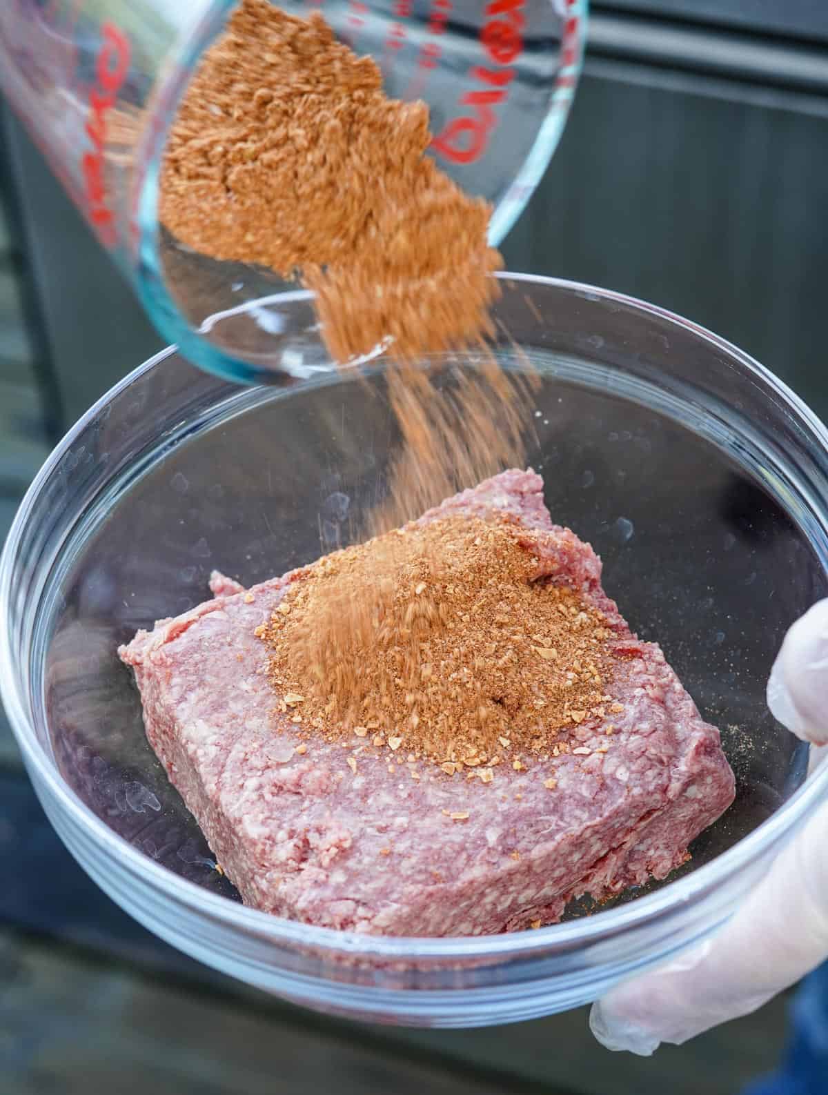 Seasoning ground beef with taco seasoning