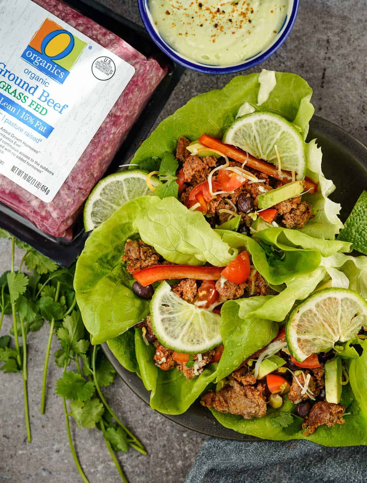 Ground beef lettuce wraps with a pound of O Organics ground beef packaging