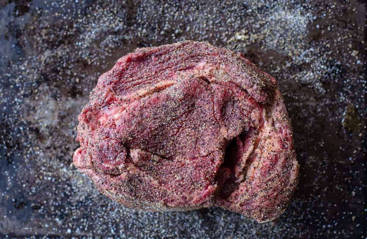 Raw Chuck Roast with seasoning