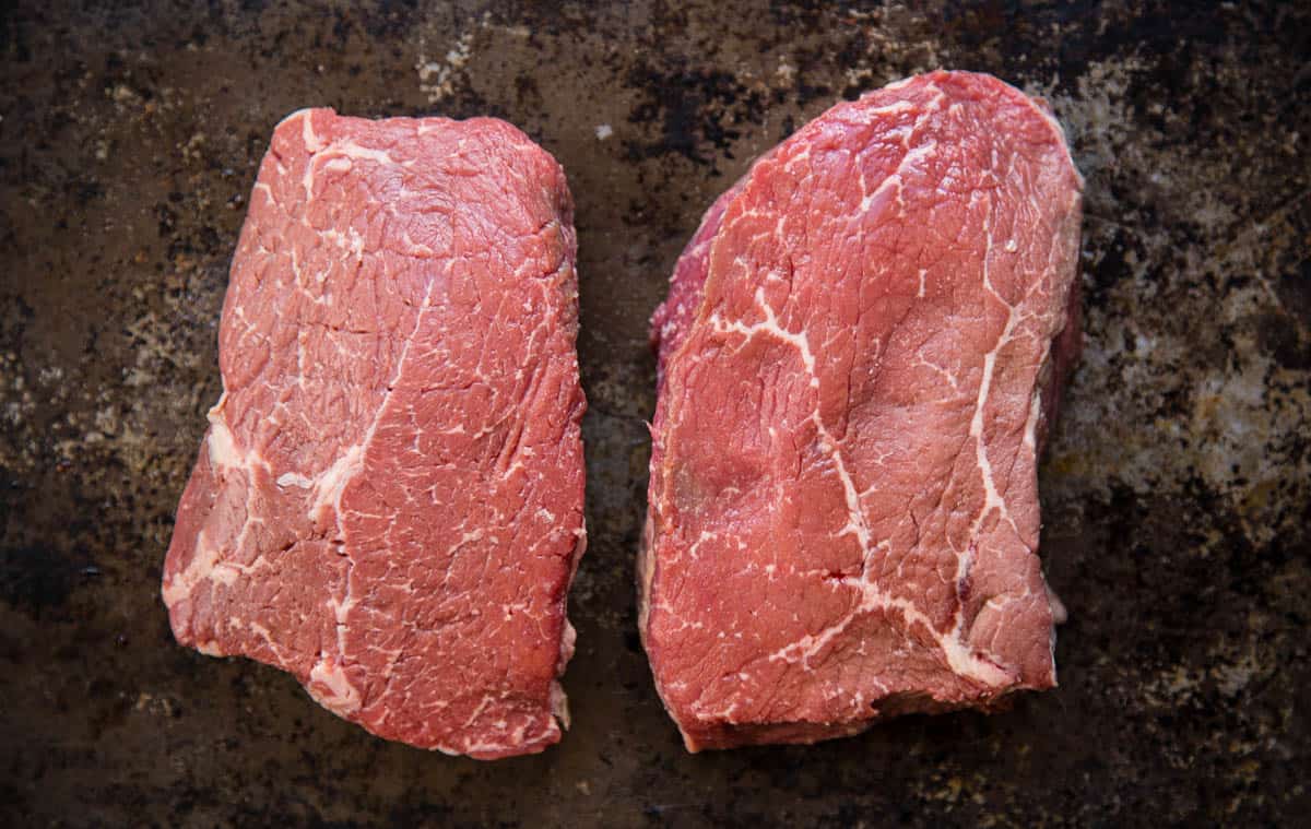 Two sirloin steaks on a plate