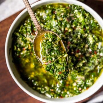 bowl of Jalapeño chimichurri sauce with a spoon