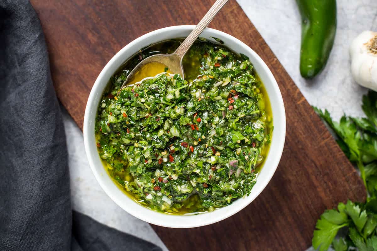 Jalapeño chimichurri sauce in a white bowl