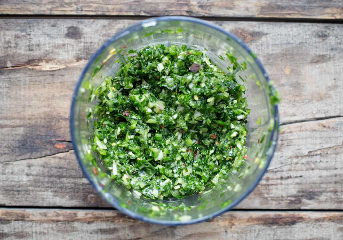 dry ingredients for a jalapeño chimichurri sauce in a food processor