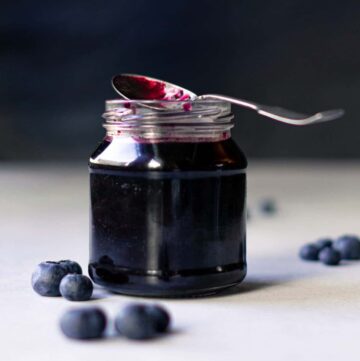 Blueberry Simple Syrup in a mason jar.