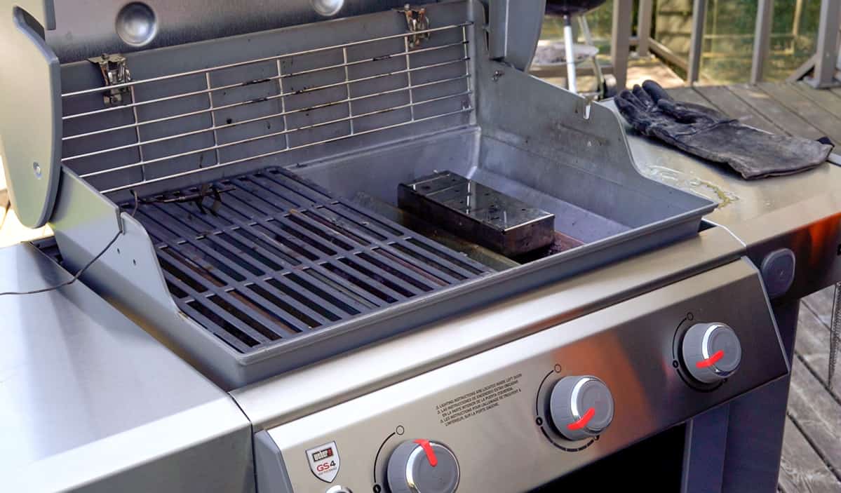 a smoker box on a gas grill