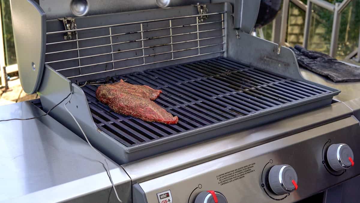 Tri Tip smoking on a gas grill over indirect heat