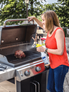 Mary Smoking beef on a gas grill