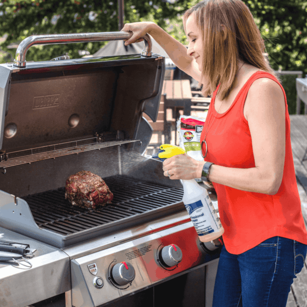 Mary Smoking beef on a gas grill