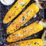 Grilled Corn on the cob with herb butter.