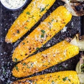 Grilled Corn on the cob with herb butter.