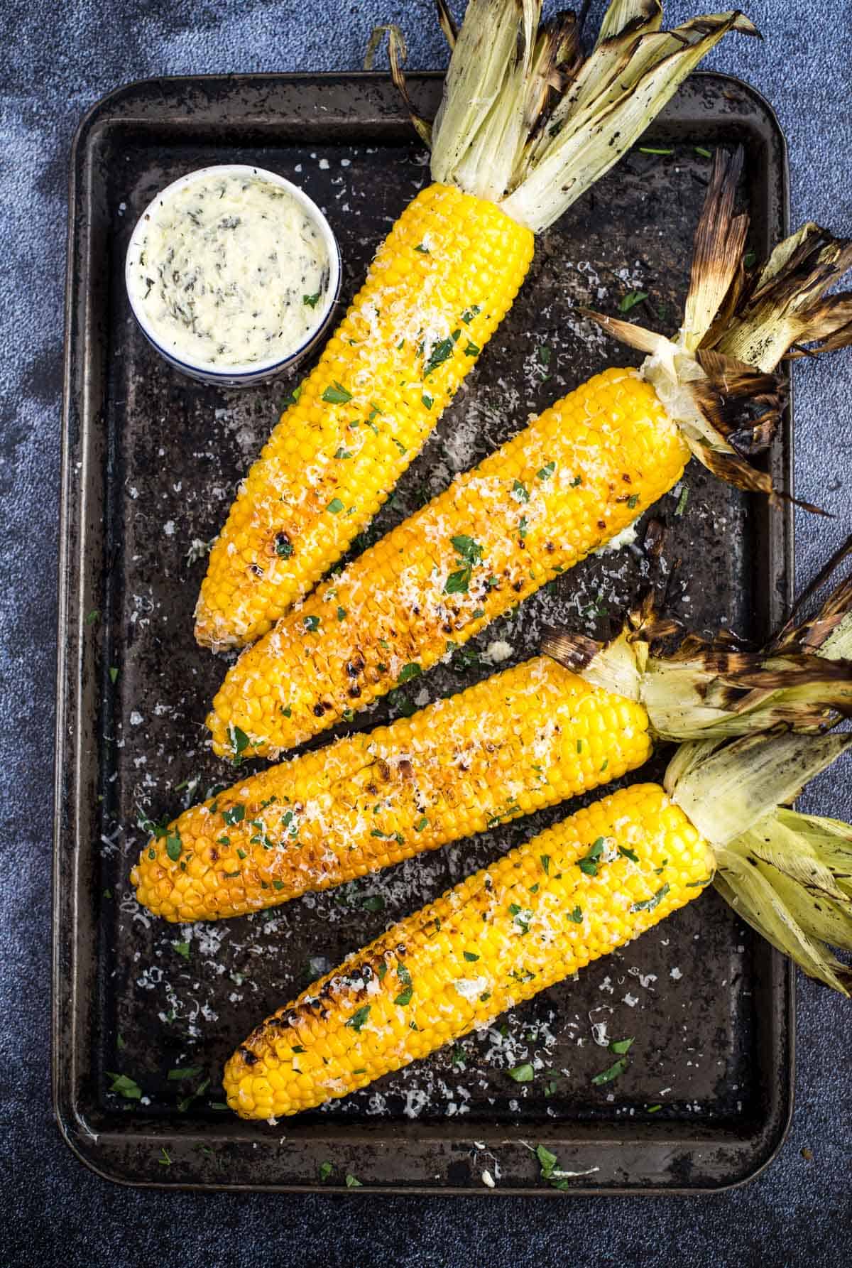 Grilled Corn on the Cob with compound herb butter.
