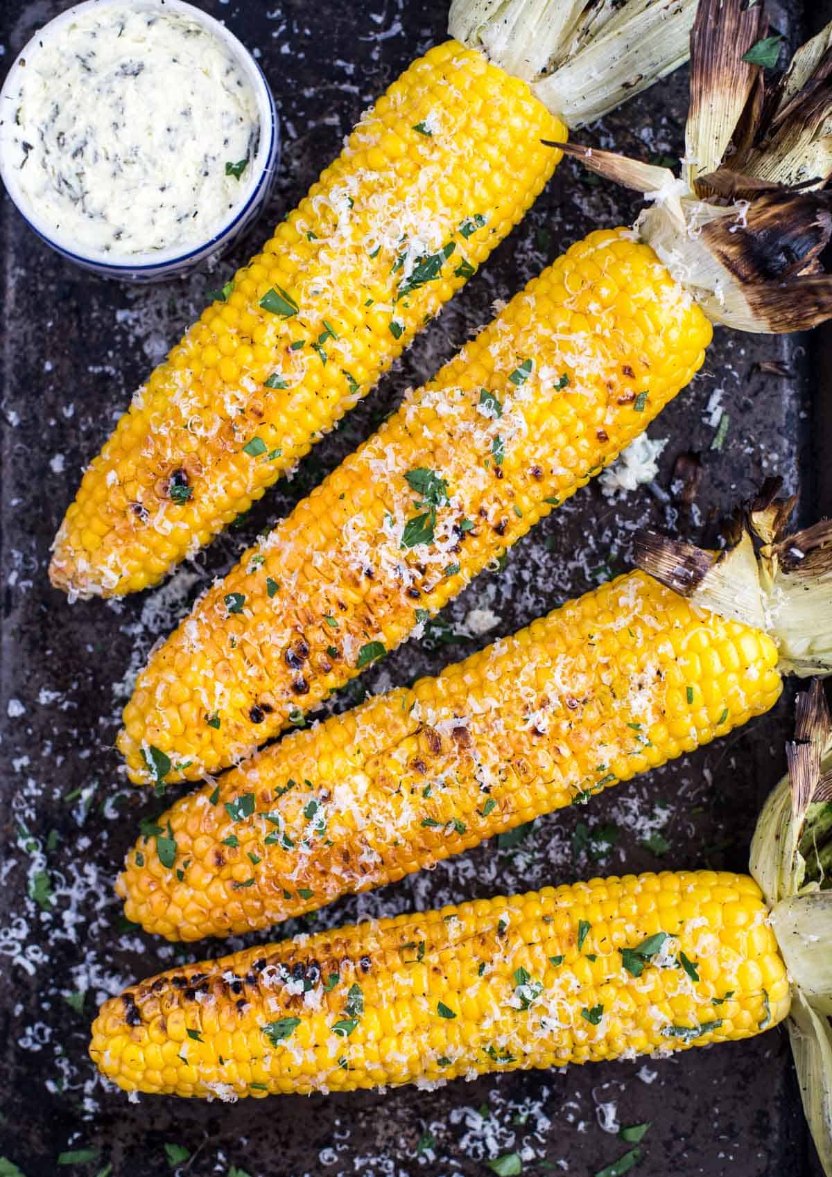 Grilled Corn on the cob with herb butter.