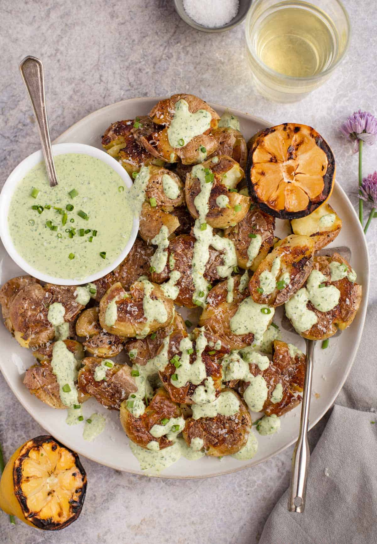 Grilled Smashed Potatoes on a white plate