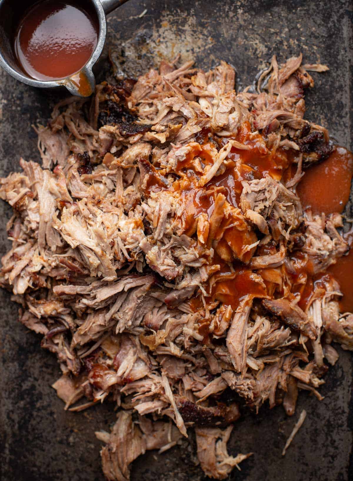 Leftover smoked pulled pork on a sheet pan